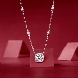 Macro shot of 925 silver moissanite halo pendant necklace with decorative bezel-set diamonds