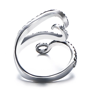Detailed view of silver octopus ring featuring a polished punk style wavy design