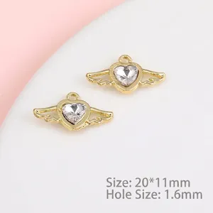 Detail of gold heart angel wing charm with crystal, 20x11mm size for DIY jewelry making