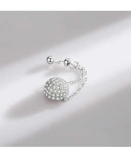Macro detail of S925 sterling silver chain ring featuring a sparkling pavé diamond sphere