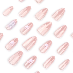 Nude pink cat-eye press-on nails with cute rabbit and paw prints in almond shape