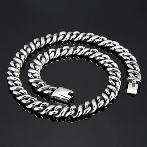 Detail of silver stainless steel Cuban link chain necklace with a secure box clasp
