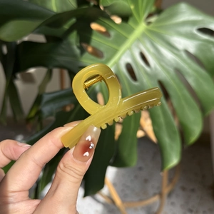 Elegant yellow butterfly hair claw clip for women's French style hair styling