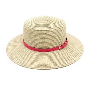 Summer flat top straw sun hat in beige with a stylish magenta decorative leather band