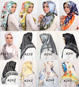 Collage of 90cm floral silk scarves showing twelve distinct colorful patterns and designs