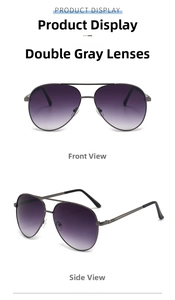 Close-up of classic aviator sunglasses with gunmetal frames and gradient grey lenses