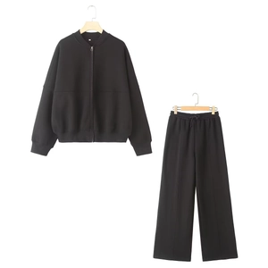 Women's black zip-up bomber jacket and wide-leg sweatpants two-piece tracksuit set