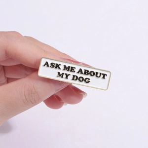 Funny enamel pin badge with 'Ask Me About My Dog' text in white and gold finish