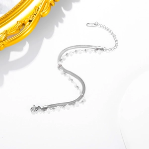 Silver double-layer snake bone chain and bead bracelet with minimalist layered design