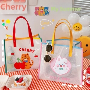Cute transparent PVC jelly handbag with cartoon rabbit and cherry patterns for girls
