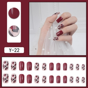 Short press-on nails in burgundy and leopard print with 24-piece full set