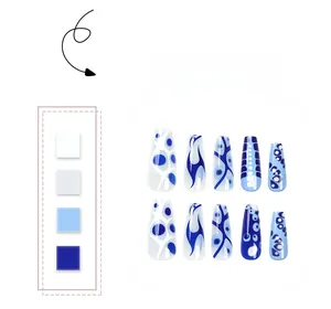 Detail of blue and white long ballerina press-on nails with abstract flame patterns