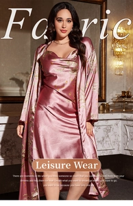 Detail of pink floral satin sleepwear set featuring long sleeve robe and v-neck nightgown