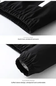 Detail of elasticated hem and windproof cuffs on a black men's casual sports tracksuit