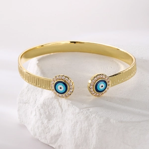 Minimalistischer 18K vergoldeter Evil Eye Armreif mit blauem Emaille und Zirkonia