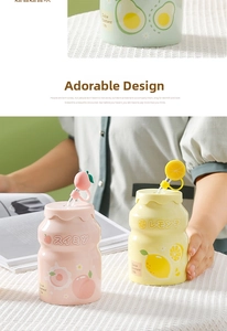Close-up of cute probiotic-style ceramic mugs with fruit charms and pastel colors