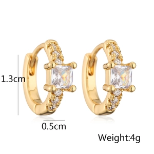 Detail showing gold huggie earrings with square zircon stone and 1.3cm size dimensions