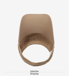 Internal structure detail of khaki knitted sports visor showing texture and inner lining