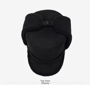 Top view of black winter trapper hat with suede finish and faux lamb wool ear flaps