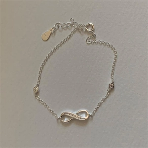 Elegant S925 sterling silver infinity bracelet with sparkling cubic zirconia accents