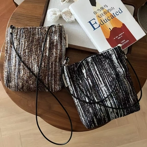 Retro distressed denim crossbody phone bag in brown and black striped woven fabric