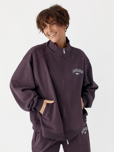 Detail of dark purple zip-up hoodie set featuring white BADBLOOD embroidery