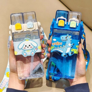 Detail of square children's water bottles with cartoon designs and adjustable carry straps