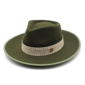 Detailed view of dark olive wool fedora hat with woven band and gold metal logo pin