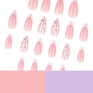 Pink almond press-on nails with silver holographic French tips and small white flower accents