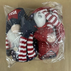 Detailed view of Patriotic Independence Day Gnomes in stars and stripes inside packaging
