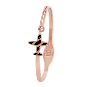 Vue détaillée de la bague avion en or rose 18 carats avec rayures noires et zircone