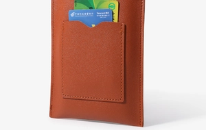 Detail view of brown leather mobile pouch featuring a functional dual card slot design