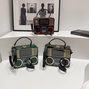 Retro radio acrylic handbag in red, green and black colors with adjustable strap