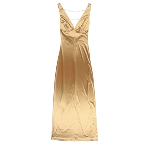 Detail of champagne gold satin maxi dress with deep V-neckline and triple beaded chains