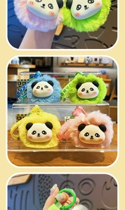 Detail of four colorful plush panda keychains with silicone Panda wrist straps