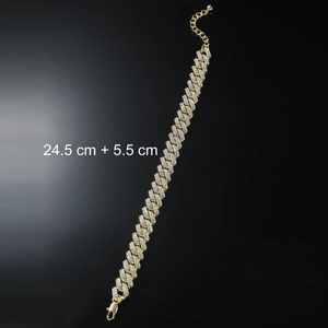 Detail of gold Cuban link anklet with clear crystals, 24.5cm length and lobster clasp