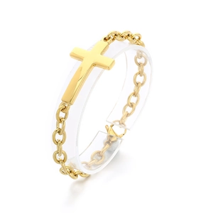 Minimalist gold stainless steel cross bracelet on a professional display stand