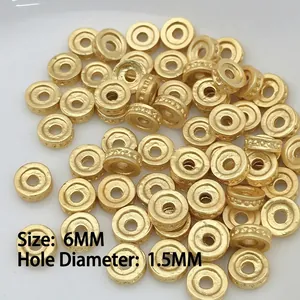 Detailed macro view of 6mm golden spacer beads with 1.5mm holes for DIY jewelry