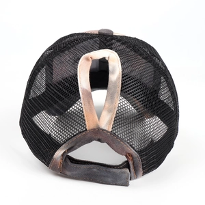 Detail of ponytail baseball cap featuring dual-layer hole and breathable black mesh fabric