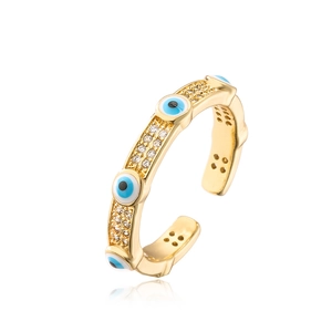 Close-up of gold-plated open ring featuring a blue enamel evil eye and pavé zircon stones