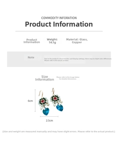 Detail view of ethnic beaded earrings with blue glass heart pendant and copper hook