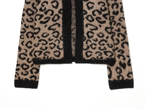 Detailed close-up of leopard jacquard knit cardigan showing fuzzy mohair wool texture