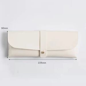 Cream leather sunglasses pouch with metal stud closure, measuring 225mm by 90mm