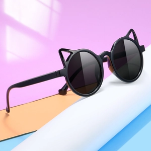 Fashionable cat ear round sunglasses for children with black frames and dark lenses