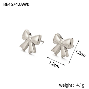 Detailed view of silver bow stud earrings showing 1.2cm size and 4.1g weight specifications