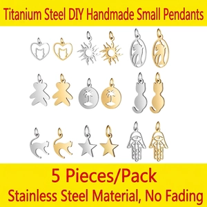 5pcs stainless steel DIY charms with heart, sun, and hand designs in gold and silver