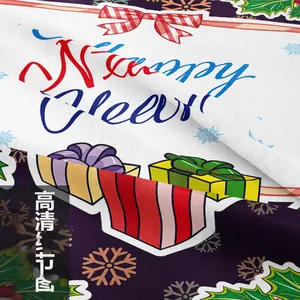 Detailed view of Happy New Year textile fabric with festive prints and woven texture