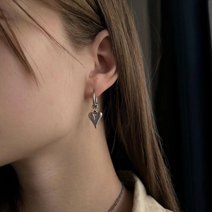 Polished silver heart pendant earrings in titanium steel for a trendy fashion look