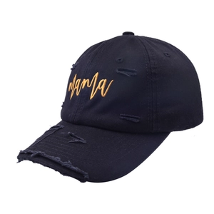 Detail of vintage black baseball cap with orange Mama embroidery and distressed holes