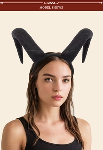 Front view of a model wearing black devil horn headband for Halloween cosplay